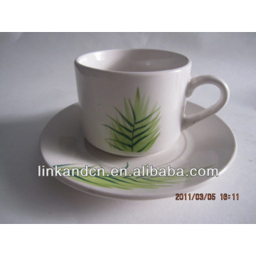 Haonai exportado verde hierba taza de cerámica y platillo